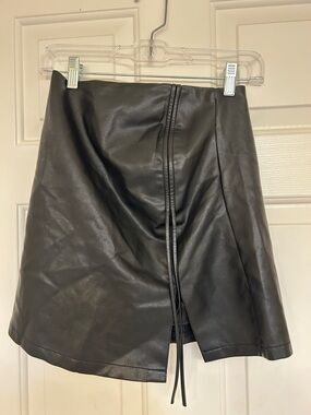 Sleek Black Faux Leather Mini Skirt with Front Tie Detail